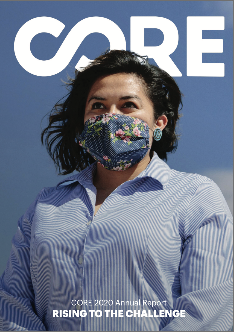 A cover photo of CORE's 2020 Impact Report. A woman wearing a facemask during the COVID-19 pandemic.