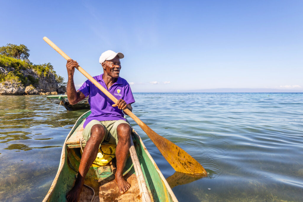 Haitian fisher in the Nippe, on the water.