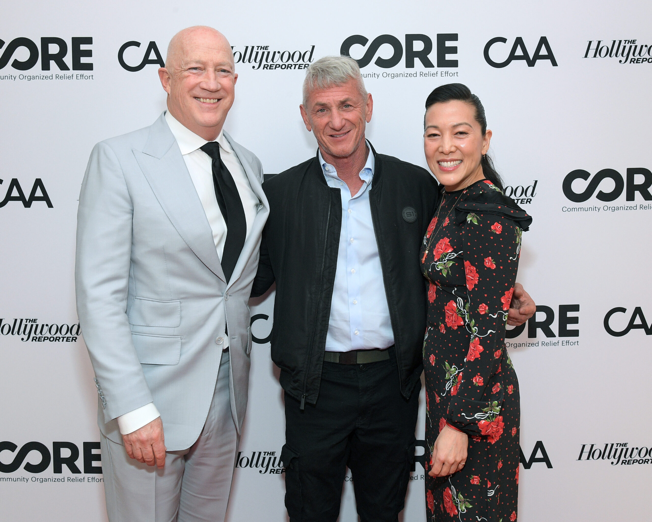 Board Member, Bryan Lourd and Cofounders Sean Penn and Ann Lee pose for a photo at the March 5th Pre-Oscars private benefit dinner.