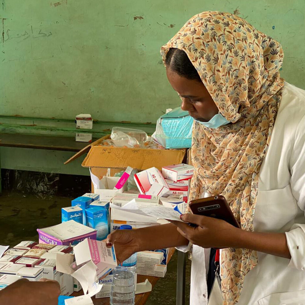 CORE distributing medication and giving health assistance to the communities in Sudan
