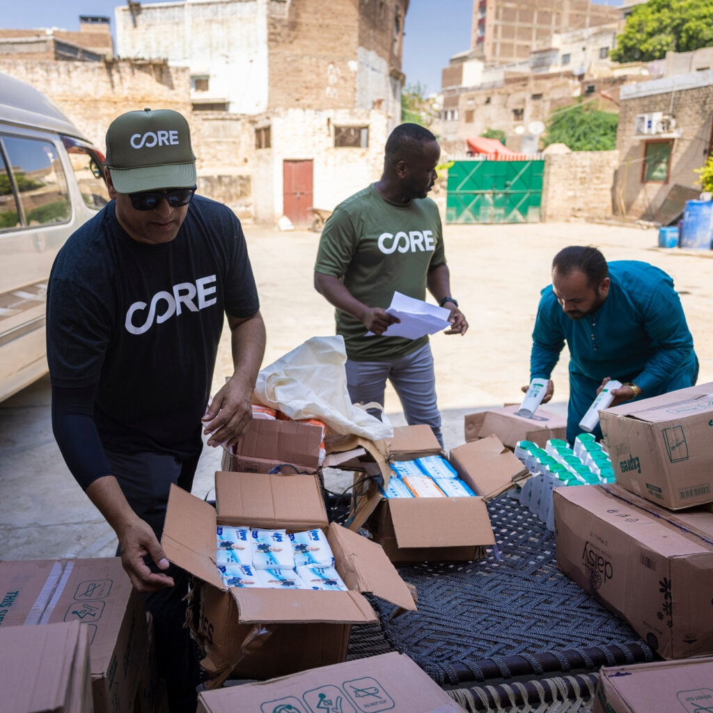 CORE staff distributing health kits in Haiti