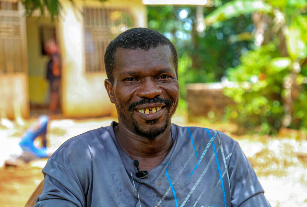 Edmund, a farmer in Haiti, poses for a photo.