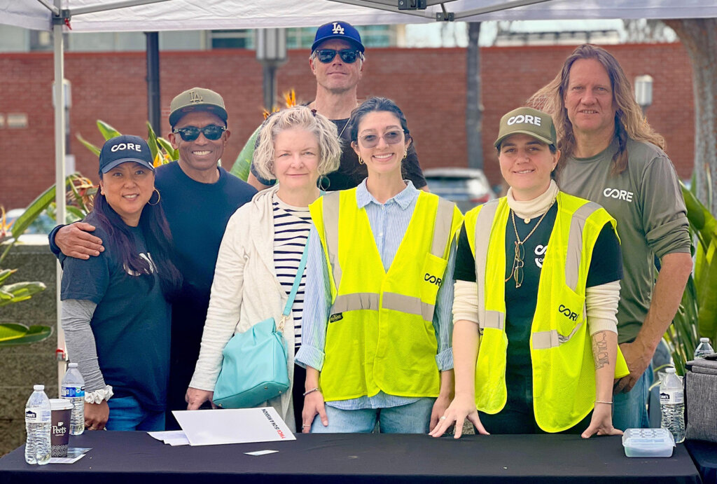 Members of CORE's team, pose for a photo at an event where they signed up people for cash and voucher assitance.