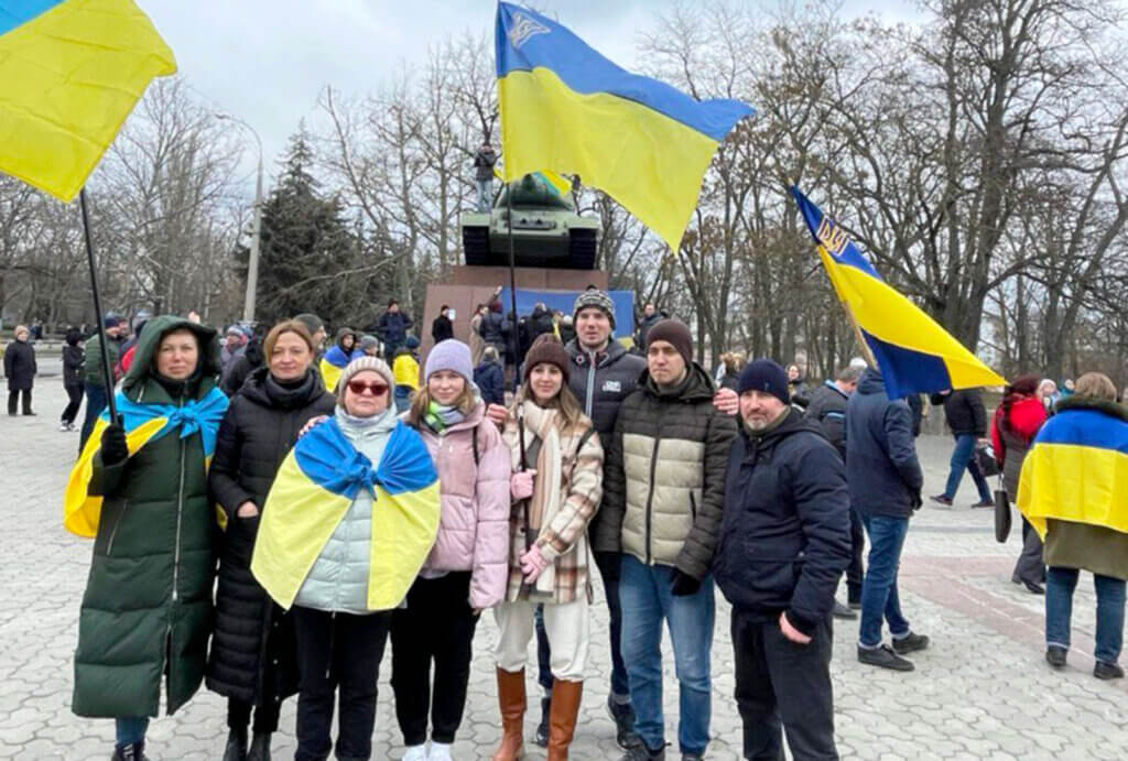 A group of people gather during a pro-Ukraine demonstration.