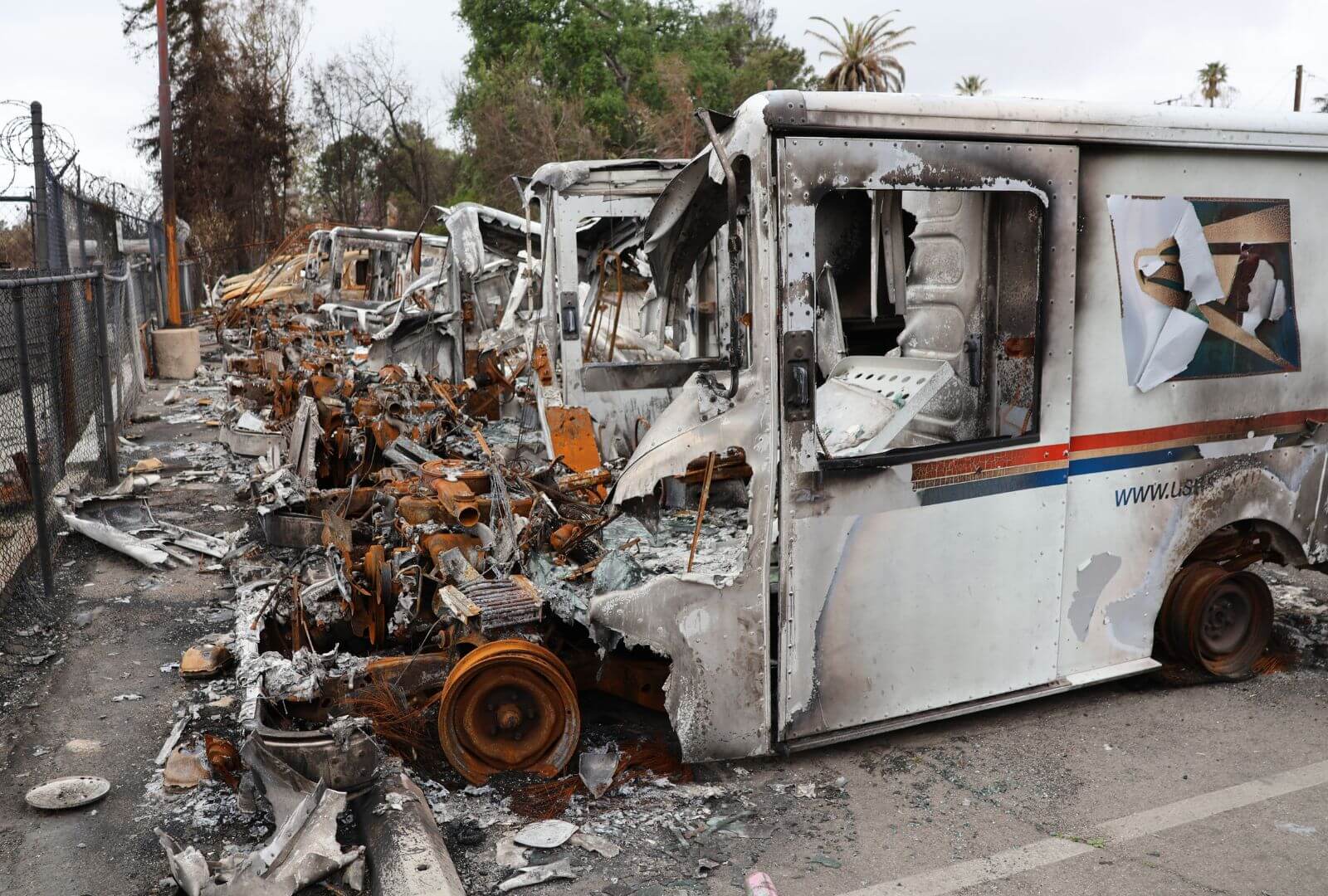 Charred mail trucks