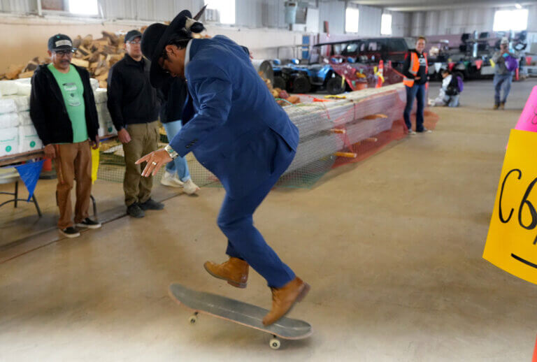 Navajo Nation President, Buu Nygren doing skate tricks at the resource distribution.