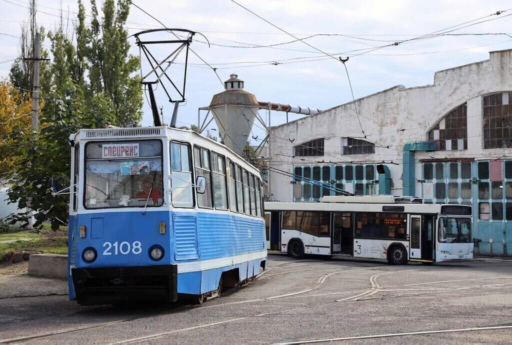 A tram in Ukraine traveling on tracks.
