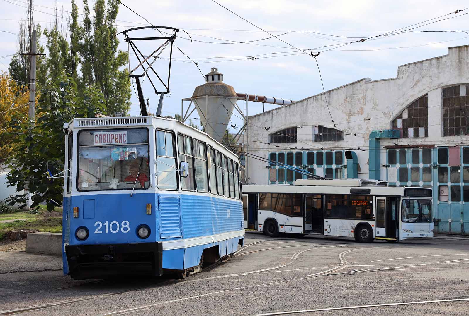 A tram in Ukraine traveling on tracks.