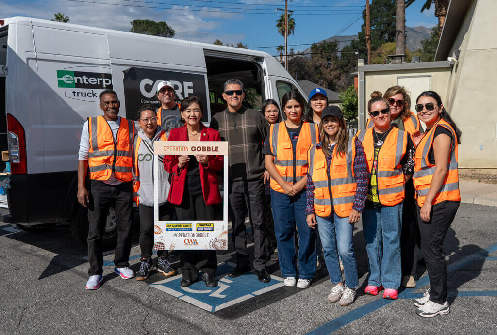 CORE staff posed with Rep Judy Chu for the Thanksgiving food distribution.