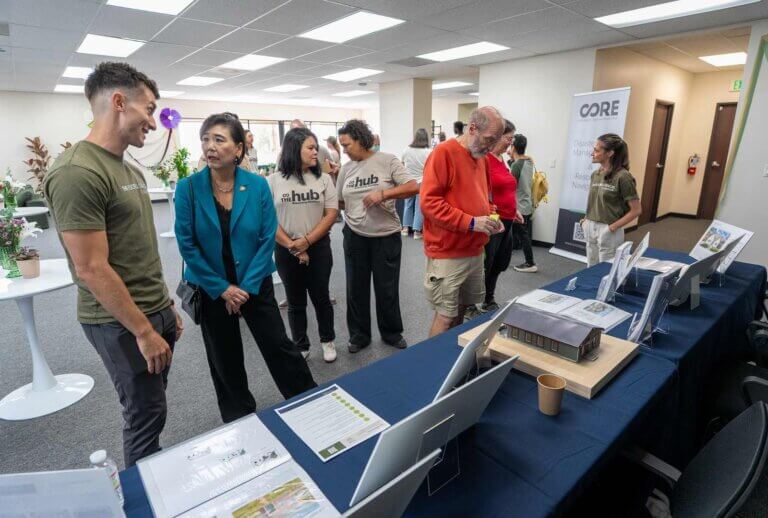 Representative Judy Chu stands in The Hub's main floor space.