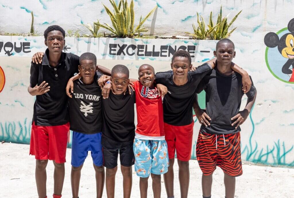 On the final day of camp, the boys posed for a photo after a pickup soccer game.
